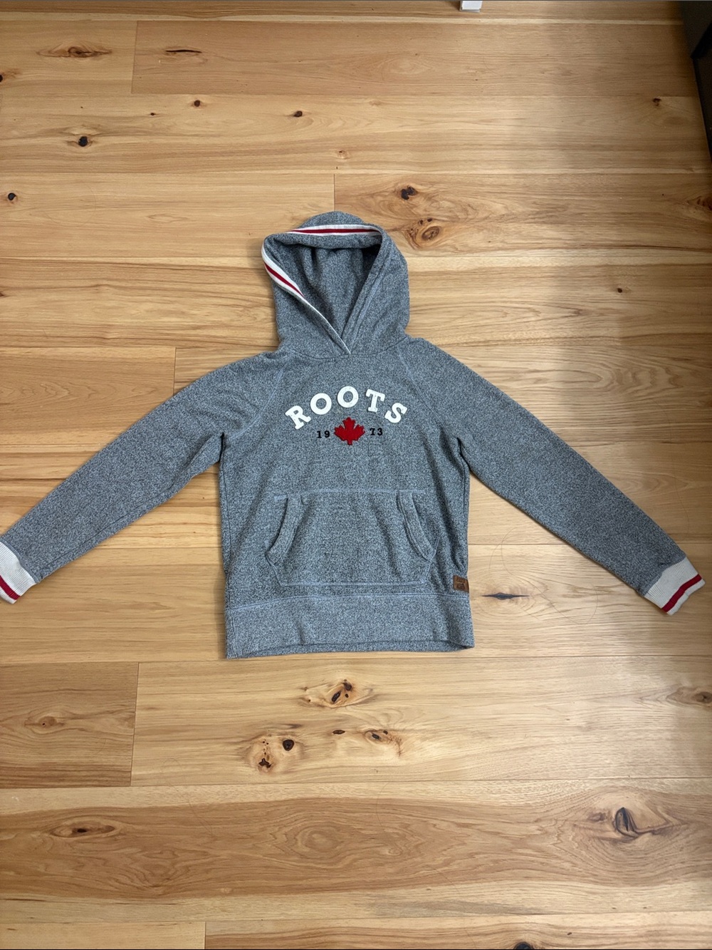 Roots Women’s Grey Hoodie with Red Maple Logo